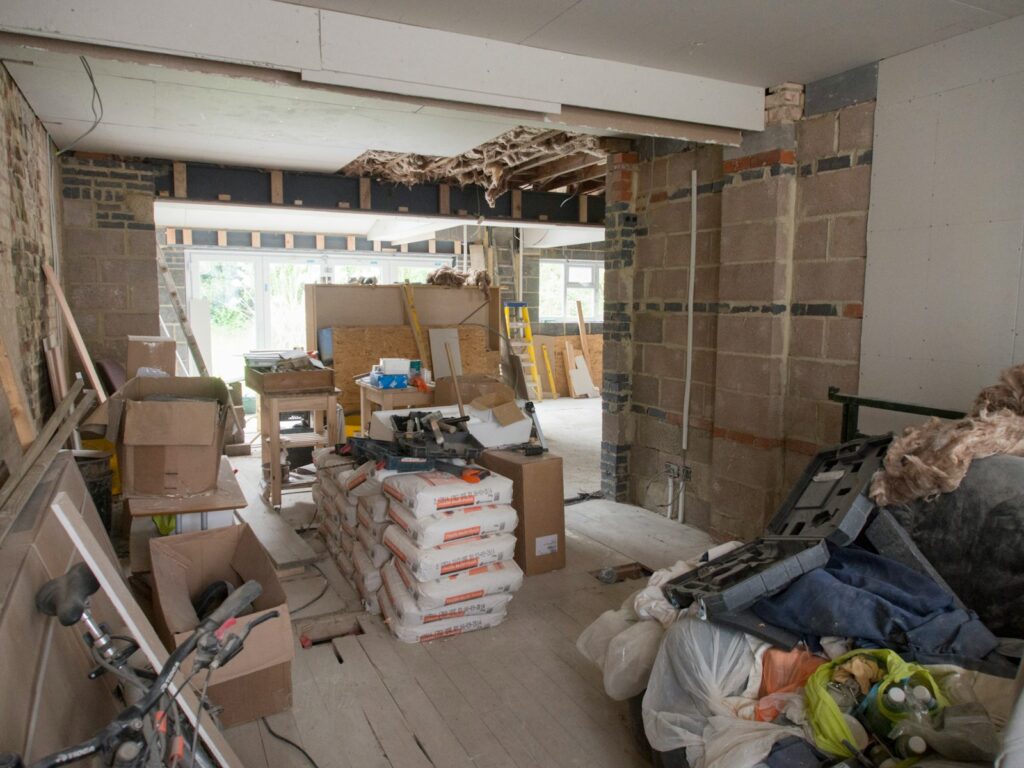 How to Keep Your Renovation on Schedule and Avoid Renovation Money Disputes 6 a room filled with lots of boxes and boxes